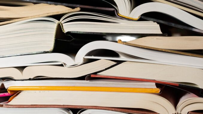 Stack of open books