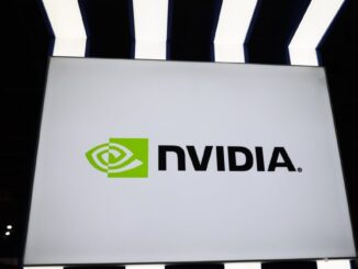 A large Nvidia logo at a conference hall