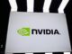 A large Nvidia logo at a conference hall