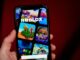 The Roblox app displayed on a smartphone