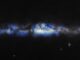 An artist’s composition of the Milky Way seen with a neutrino lens (blue).